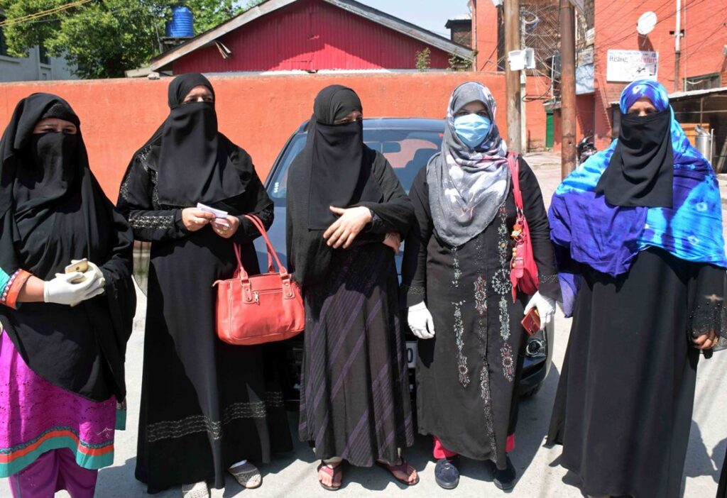 The-Pakistani-wives-of-former-Kashmiri-militants-who-returned-from-Pakistan-under-a-rehabilitation-scheme-Monday-staged-protest-demonstrations-at-Press-Enclave-5